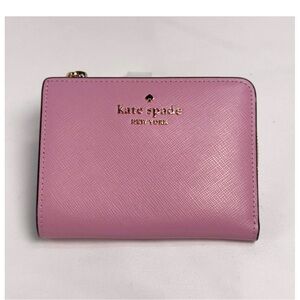 kate spade pink compact zip-around wallet with gold logo